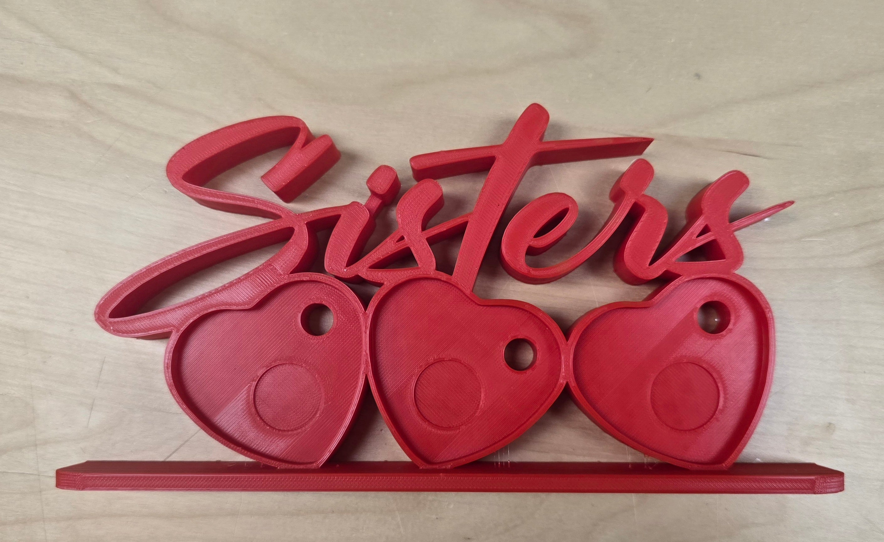 Sisters photomagnet frame with 3 slots for heart-shaped photo magnets