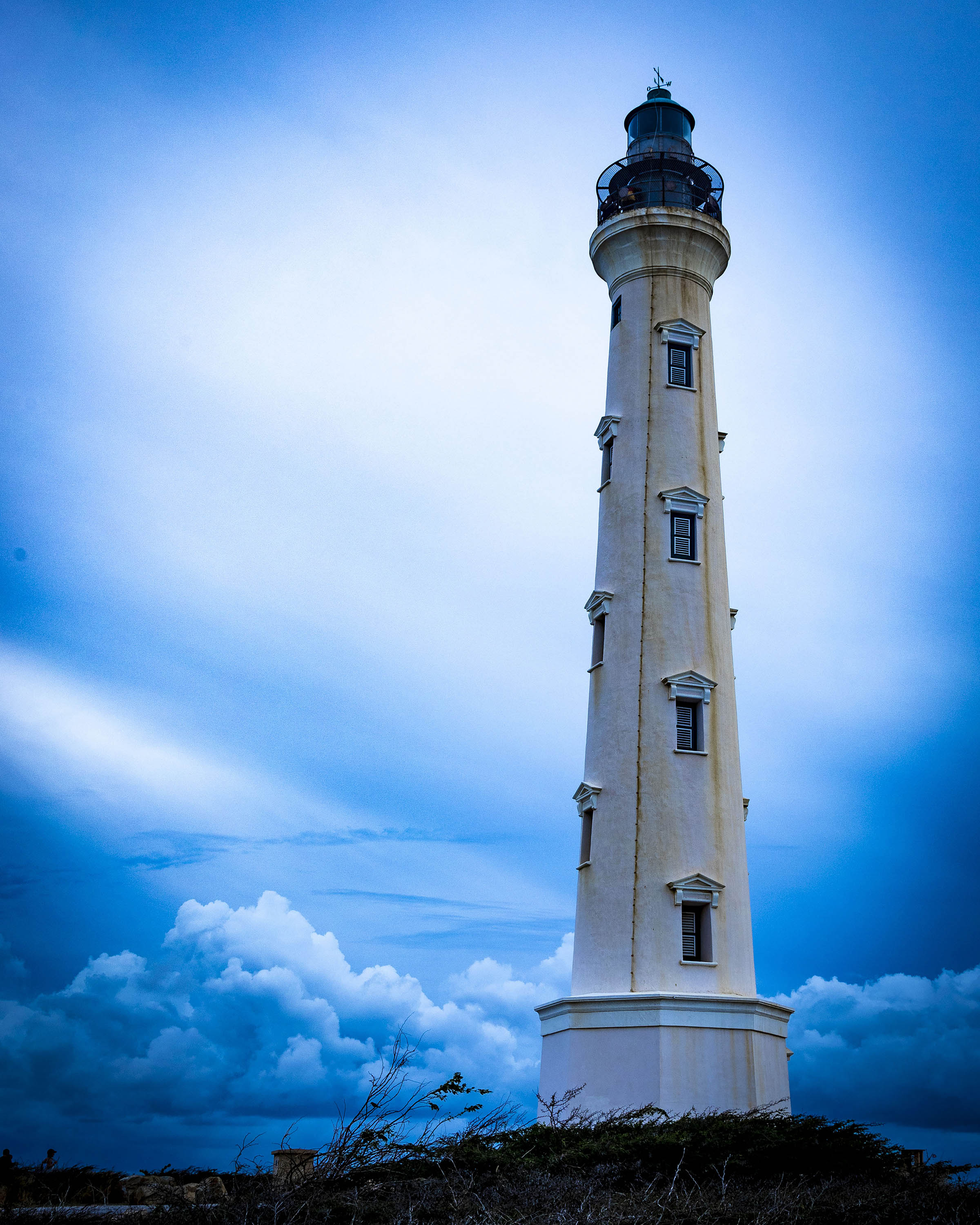 California Lighthouse rising above Noord Aruba landscape - 16x20 metal print