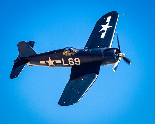 F4U Corsair L69 WWII fighter with distinctive gull wings in flight - 16x20 metal print