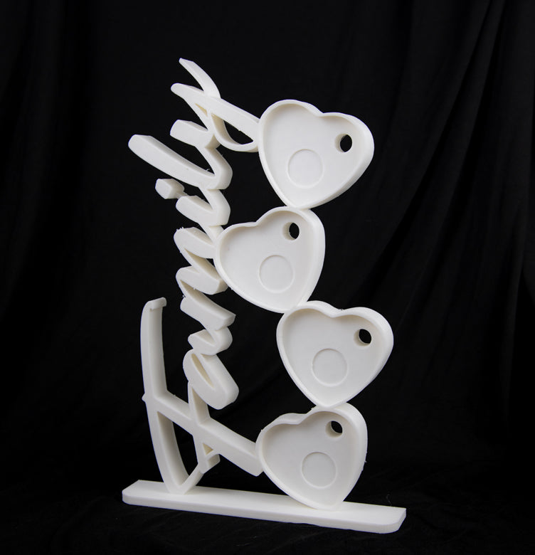 Family photomagnet frame witl 4 slots for heart-shaped photomagnets